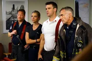 Pictured: (l-r) Christian Stolte as Randy "Mouch" McHolland, Kara Killmer as Sylvie Brett, Jesse Spencer as Matthew Casey, David Eigenberg as Christopher Herrmann.