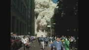People run from the collapse of the World Trade Center. (Fox Archives)