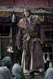 Der fahrende Bader (Stellan Skarsg&aring;rd) bietet den Menschen seine Dienste an: Z&auml;hne ziehen, Schultern einrenken und Gliedma&szlig;en amputieren.