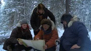 From left to right: Bob Wright, Joey Zuray, Stan Zuray, Charlie Wright map out their hunt for caribou.