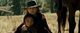 L - R: Xavier Horsechief (Little Bear), Rosalee Quaid (Rosamund Pike)