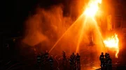 Fireman in firefighting at night.
