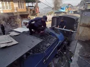 The Class B steam locomotive's saddle tank is filled with water at West Point.