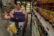 Robin and Garrett shopping at grocery store.