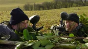 HUSBANDS BOSWORTH, ENGLAND, UK: Artist Luis V. Rey and Dr. Phillip Lars Manning taking aim at a paintball facility.