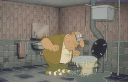 Werner, immer der Ausl&ouml;ser der Katastrophe: Bei der Reparatur einer verstopften Toilette bleibt Meister R&ouml;hrich mit dem Kopf in der Sch&uuml;ssel stecken ...