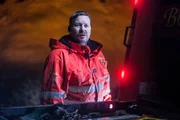 Overhalla, Norway - Jo Roger (main cast in Overhalla) helps to rescue a truck that has turned over in the Ditch. The roads are very slippery and full of ice. Jo plans how to perform the rescue.