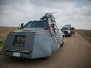 TIV and Doghouse vehicles on the road.