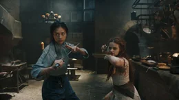 (L-R): Veronica Ngo and Joey King in 20th Century Studios' THE PRINCESS, exclusively on Hulu. Photo courtesy of 20th Century Studios. &copy; 2022 20th Century Studios. All Rights Reserved.
