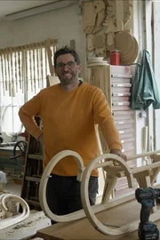 Christian Lassacher (Wagner) vor einem Rodel Christian Lassacher (Wagner) vor einem Rodel