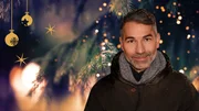 Key Visual/Cover Sendereihenbild ohne Typo zu "Weihnachtszauber mit Marcus Fahn". Lichterglanz und Pl&auml;tzchenduft: Ein besonderer Zauber liegt in der Luft. Marcus Fahn, Morgenmoderator von BAYERN 1, geht auf Streifzug durch Bayern und seine Br&auml;uche, trifft Menschen im Advent und teilt mit ihnen die Vorfreude auf die Festtage.