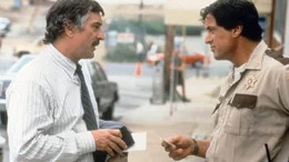 Lt. Moe Tilden (Robert De Niro, l.) und Sheriff Freddy Heflin (Sylvester Stallone)