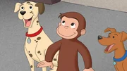 Curious George next to two dogs. Curious George next to two dogs.