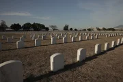 Clark Air Base, Philippines: Tombstones at Clark Cemetery. Clark Cemetery holds the remains of 8,600 people, including 2,200 American veterans and nearly 700 allied Philippines Scouts who witnessed battles from the early 1900s to the resistance against the Japanese in WWII.
