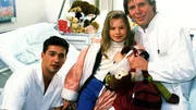 Umsorgt von Dr. Stefan Frank (Sigmar Solbach, r.) und Julian (Andreas Elsholz) f&uuml;hlt sich das Waisenkind Iris (Jana Kilka) wohl.