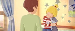 Conni verabschiedet sich von Kater Mau, bevor sie mit ihren Kindergartenfreunden verreist.