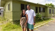 Tristyn and Kamohai Kamala posed in front of exterior of green house on Kalama Compound as seen on Renovation Aloha, Season 2