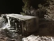 ORKANGER, NORWAY - A truck flipped over on the side due to slippery conditions.