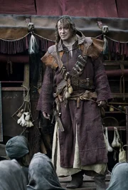 Der fahrende Bader (Stellan Skarsg&aring;rd) bietet den Menschen seine Dienste an: Z&auml;hne ziehen, Schultern einrenken und Gliedma&szlig;en amputieren.