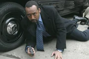 Det. Ed Green  (Jesse L. Martin)