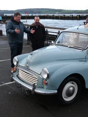 Mike and contributor looking at trade in car (ws). mike and contributor looking at trade in car (ws).