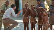 Levison dances with children from the village of Mababe