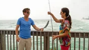 Homebuyers Craig and Hilary celebrate after a successful catch, as seen on HGTV's Beach Hunters.