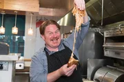 Host Casey Webb in the kitchen with the Spaghetti Grilled Cheese at Lot 579's Burnt Crumbs.