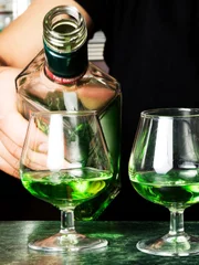 Glasses of absinthe