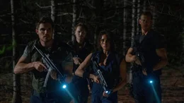 l-r: Chris Redfield (Robbie Amell), Richard Aiken (Chad Rook), Jill Valentine (Hannah John-Kamen), Albert Wesker (Tom Hopper)
