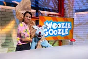 Es geht um richtig große Tiere und Woozle (re.) stellt entsetzt fest, dass er nicht dazu gehört. Er ist sogar kleiner als Maria (li.)! Das kann so nicht bleiben. Doch seine Erfindungen lassen Woozle leider nicht wachsen. Richtig schief geht die Sache allerdings erst, als Woozle beschließt aus einer Mücke einen Elefanten zu machen... Es geht um richtig große Tiere und Woozle (re.) stellt entsetzt fest, dass er nicht dazu gehört. Er ist sogar kleiner als Maria (li.)! Das kann so nicht bleiben. Doch seine Erfindungen lassen Woozle leider nicht wachsen. Richtig schief geht die Sache allerdings erst, als Woozle beschließt aus einer Mücke einen Elefanten zu machen...