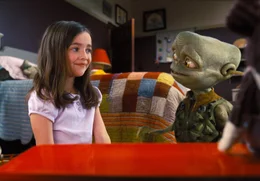 Hannah (Ashley Boettcher) bonds with friendly alien Sparks. Aliens in the Attic Ashley Boettcher