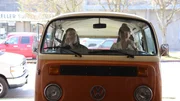 Leslie and Lyndsay driving their VW bus, Ginger.