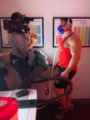 Sacramento, CA - Crew member (L) films Tony Huge as he tries to gather data on the before and after effects of steroids use in his own body. (Credit: National Geographic/Muck Media)