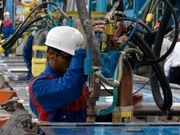 Sao Paulo, Brazil: Welding the side panels of a future New york subway car. Sao Paulo, Brazil: Welding the side panels of a future New york subway car.