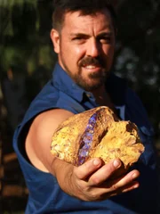 Isaac with his opal haul, Yowah QLD.