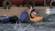 Gary Vaillancourt teaches daughter Molly MacKinnon ice-melting survival techniques.