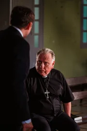 DI Richard Poole (BEN MILLER) and Father John (KENNETH CRANHAM)