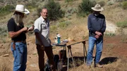 Charlie Snider, Eric Drummond, and Duane Ollinger wait around at the core sampling station to begin running tests on soil samples.