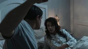 Drama: Todd (perp) lies on the bed next to Rachel (victim) and raises his arm to punch her