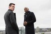 Pictured: (l-r) Eddie McClintock as Jack Payne, Omar Epps as Isaac Johnson