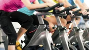 Indoor bycicle cycling in gym Indoor bycicle cycling in gym
