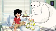 L-R: Hiro (voiced by Ryan Potter), Baymax (voiced by Scott Adsit)