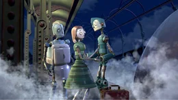 Schweren Herzens lassen Mr. und Mrs. Copperbottom ihren Sohn Rodney (r.) nach Robot City ziehen.