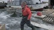 Brian Abbott heads out to check the thickness of the ice cover.