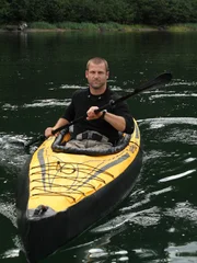 Dave Salmoni in kayak, Admiralty Island, Alaska.