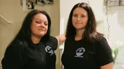 Sybil Meister and Kimberly Miller wearing their "Amoeba Awareness" shirts.