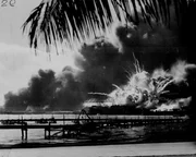Pearl Harbor, Hawaii - Following the Japanese attack on Pearl Harbor Hawaii, the U.S.S. Shaw explodes after being hit by bombs and torpedos.