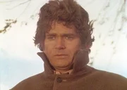Voller Trauer muss Charles (Michael Landon) die ersten Opfer der Typhus-Epidemie beklagen.