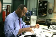 Detective Ed Green (Jesse L. Martin)
